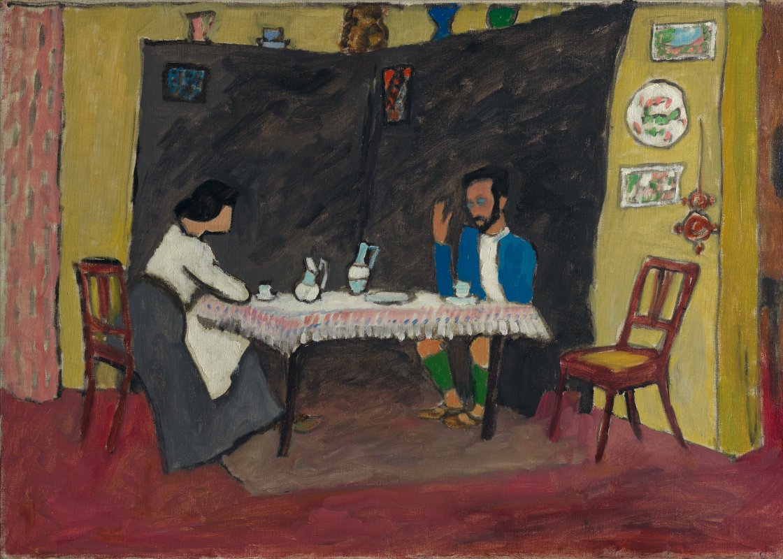 Gabriele Münter. Kandinsky and Erma Bossi at the table, 1909-1910