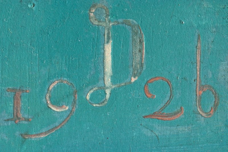 Detalle de la firma en forma de anagrama  “19D26” de la obra de Dix, “Hugo Erfurth con perro”